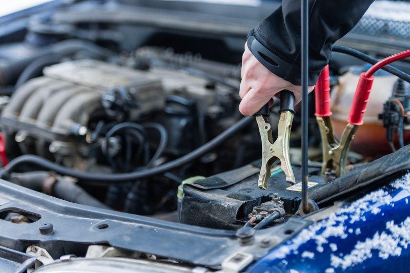 Charge a Dead Car Battery Using Jumper Cables Connecting one black cable